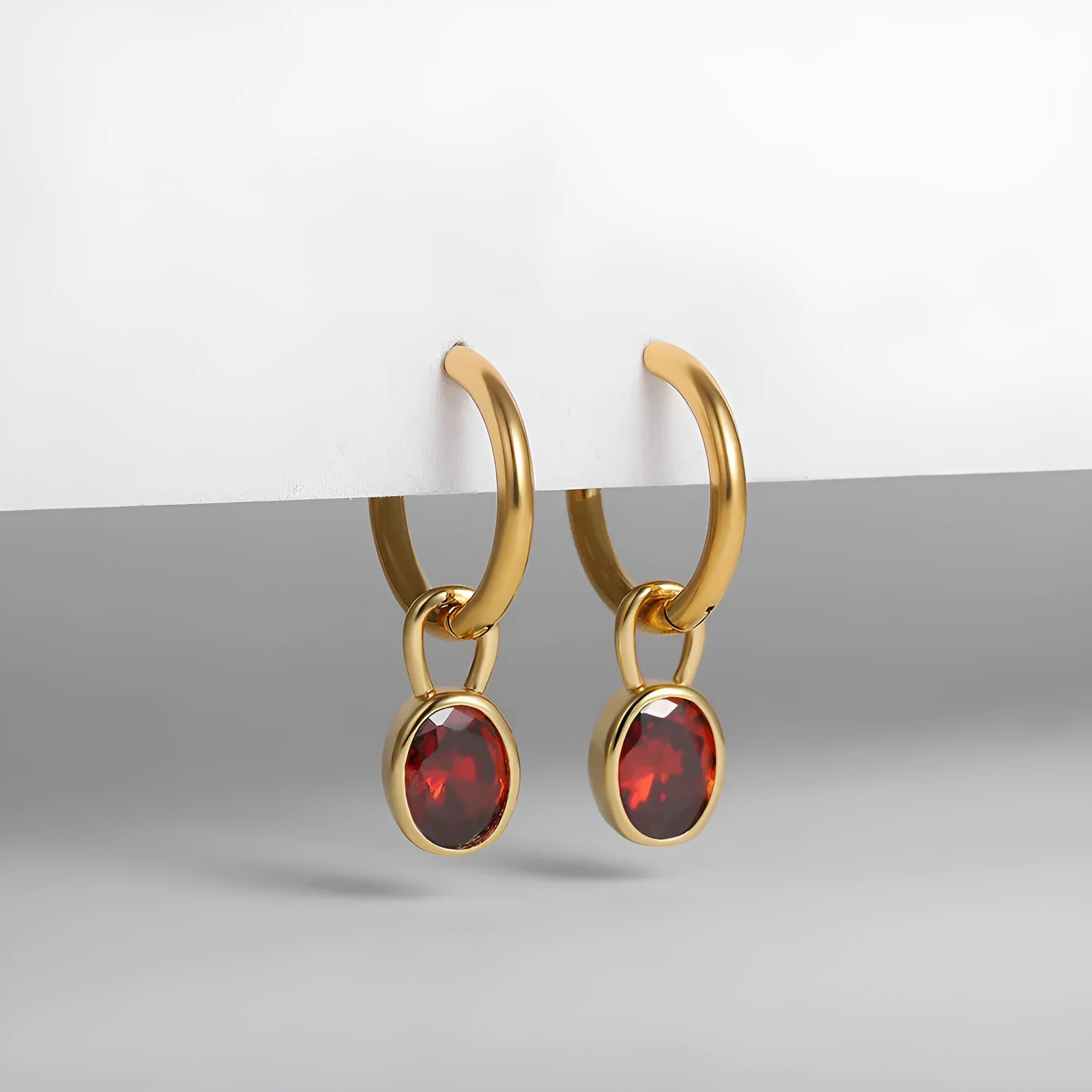 Women's retro simple oval zircon earrings in copper, showing the elliptical design on a model.