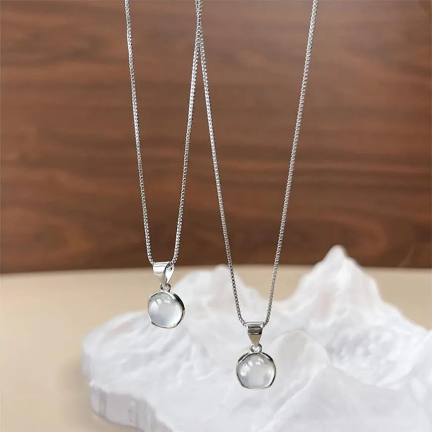Korean-style women's oval pendant necklace with artificial crystal and eight-star design on an adjustable box chain.