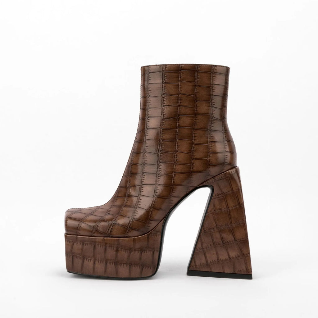 Women's artificial PU ankle boot with a high heel over 8cm, shown in a solid colour.