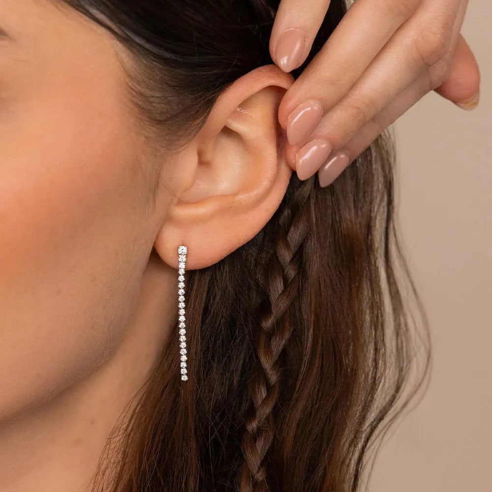 Sweet Elegance women's geometric zircon earrings in stainless steel, shown in gold and steel colour options.