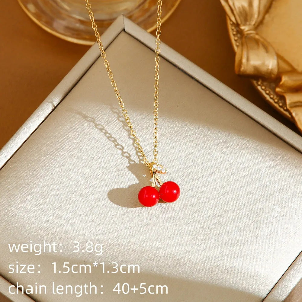 Titanium steel necklace with delicate cherry, strawberry, and pepper charms on O-ring chain