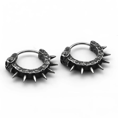 A pair of black geometric alloy earrings with copper plastic punk motorcycle detailing.