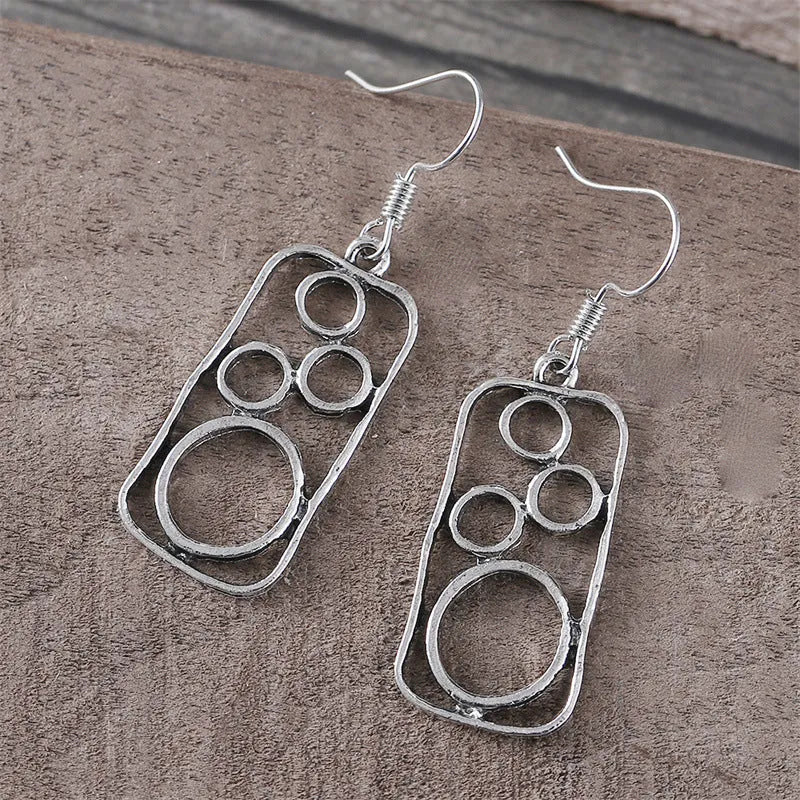 Geometric round ring earrings with irregular square design in antique silver finish