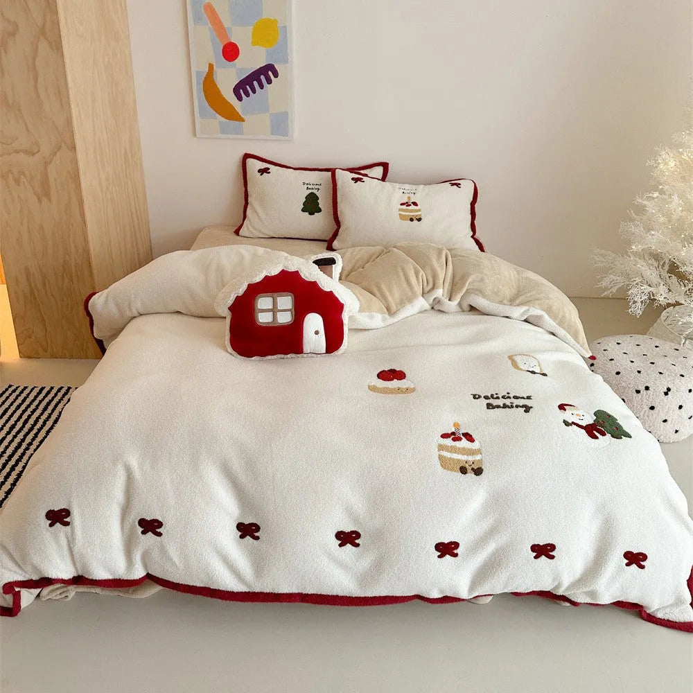 Snowman Milk Pastry cartoon print bedding four-piece set including sheet, duvet cover, and pillowcases on a bed.