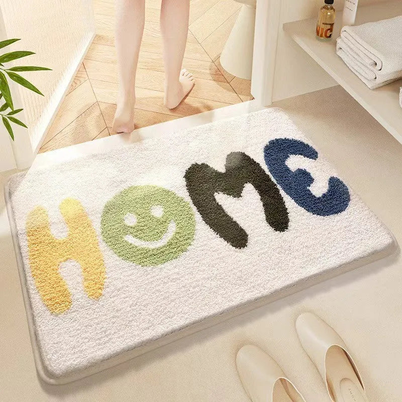 Square polyester fibre floor mat with rainbow pattern in sky sea colours and plastic bottom backing