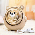 Cute puppy-themed USB desktop electric fan in various colours on a desk.