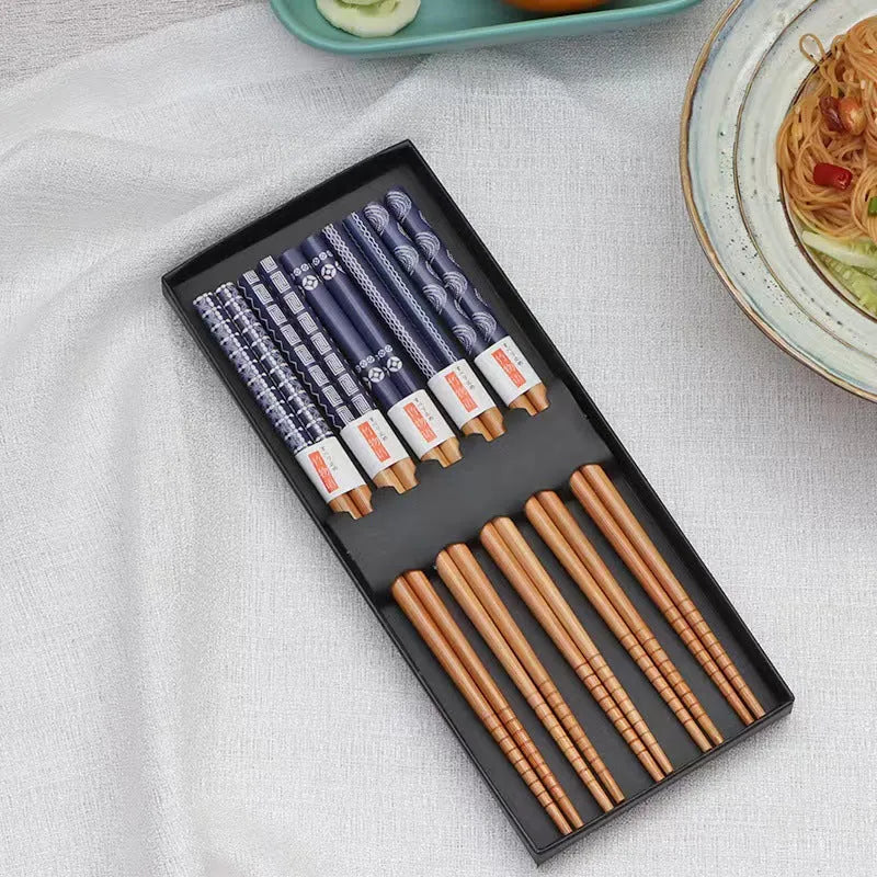 Set of five Japanese-style patterned bamboo chopsticks with lucky cat or elegant blue design.