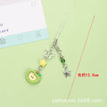 Cute fruit design mobile phone charm keychain in plastic resin with apple or strawberry motif.