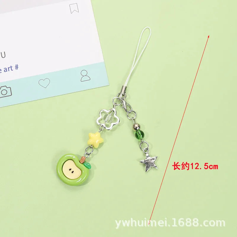 Cute fruit design mobile phone charm keychain in plastic resin with apple or strawberry motif.