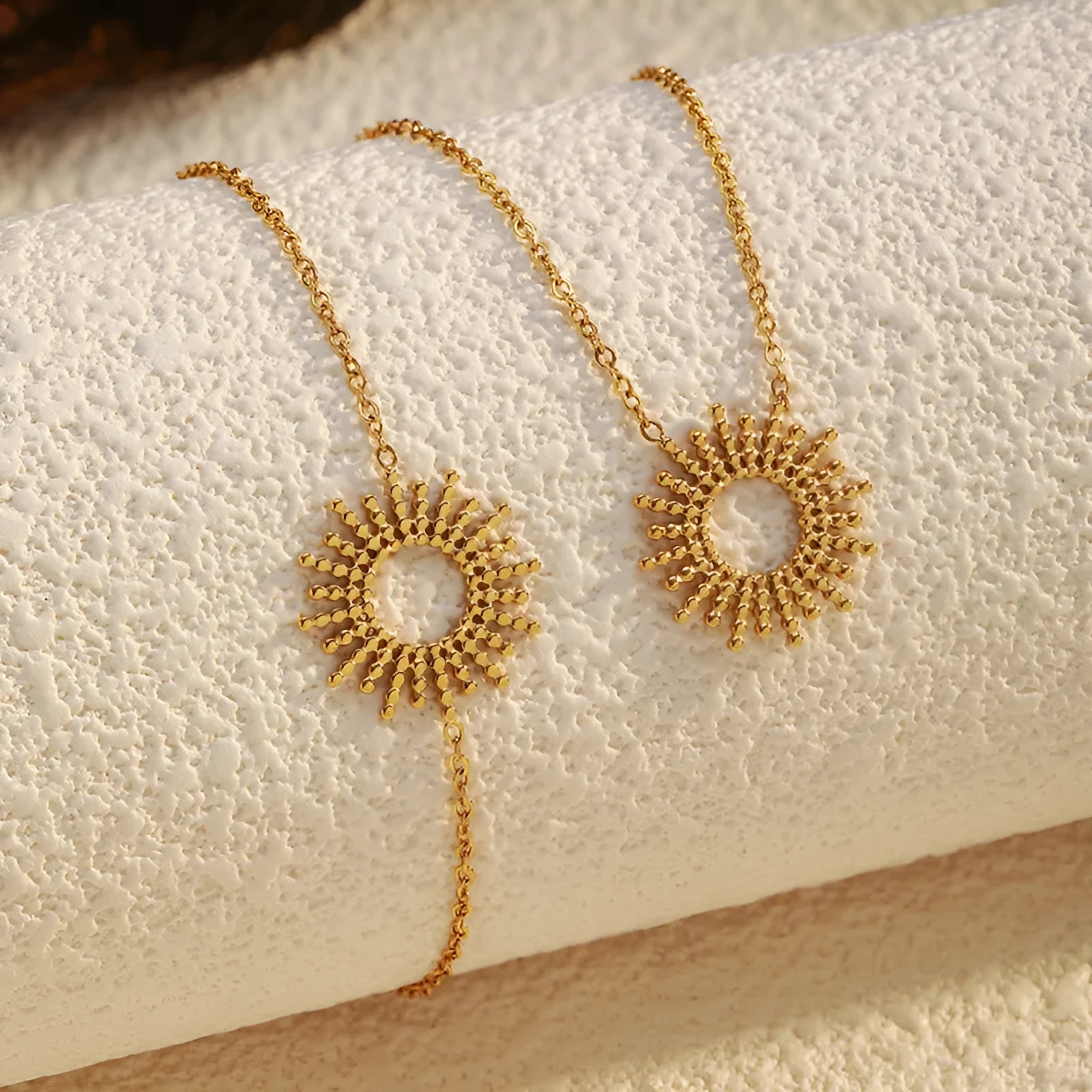 Gold sunflower bracelet and necklace set with geometric chain design