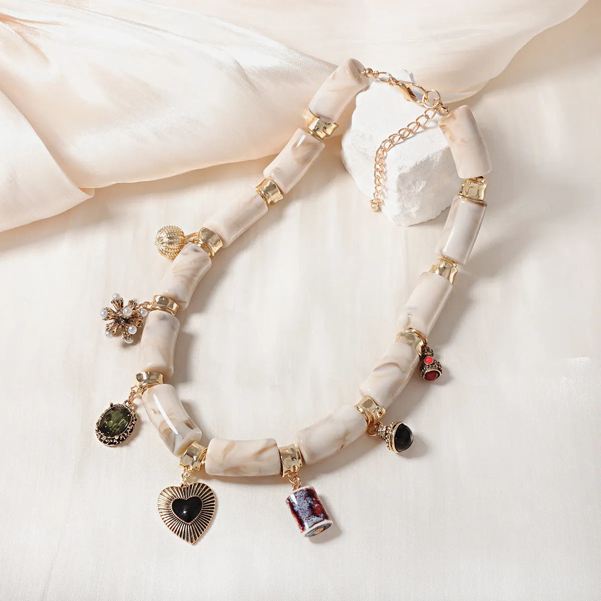 Heart-shaped resin and bamboo pendant necklace with electroplated chain