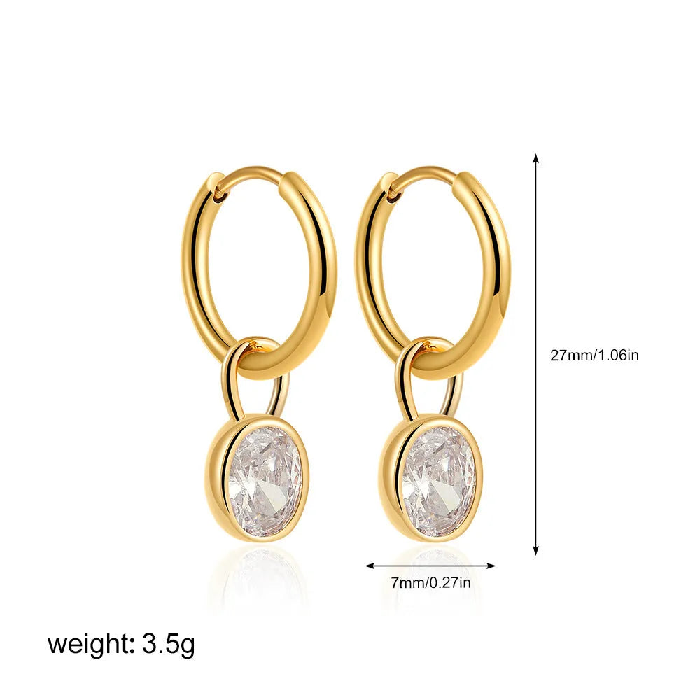 Women's retro simple oval zircon earrings in copper, showing the elliptical design on a model.