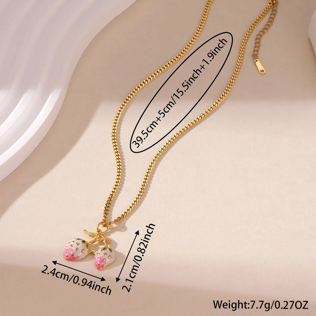 Strawberry-shaped pendant necklace in stainless steel with white or red colour options