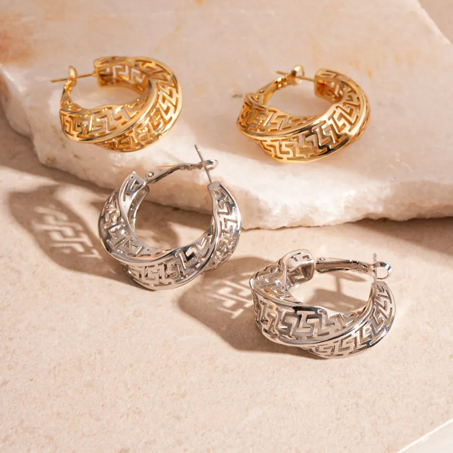 Geometric hollow stud earrings with twisted round design in silver needle-gold or silver needle-silver finish