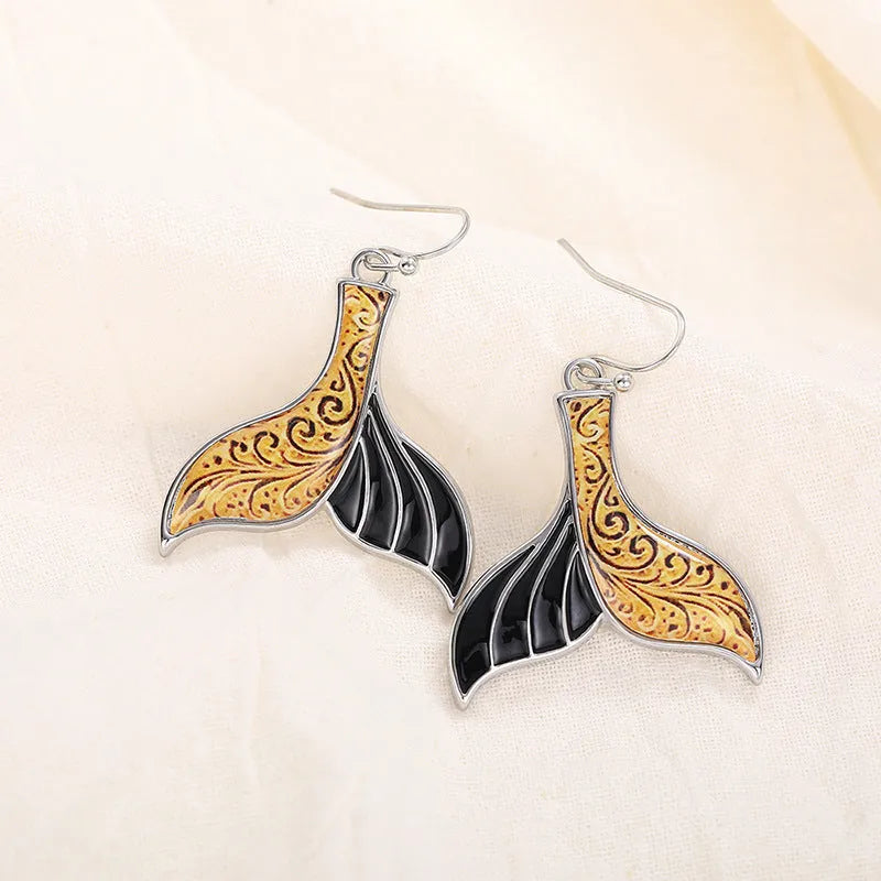 White gold colour fishtail earrings with retro whale design for women