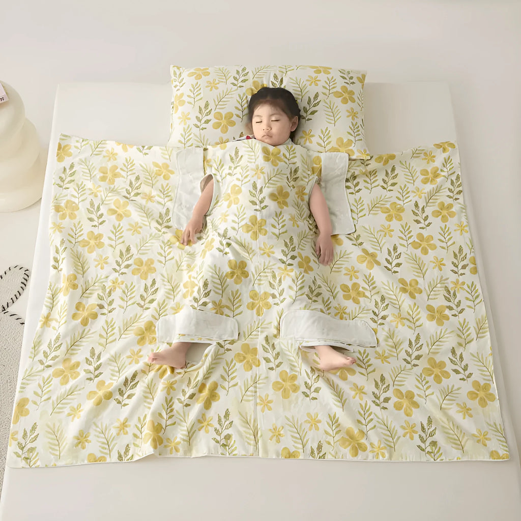 Anti-kick summer blanket in a choice of colours and sizes on a bed.