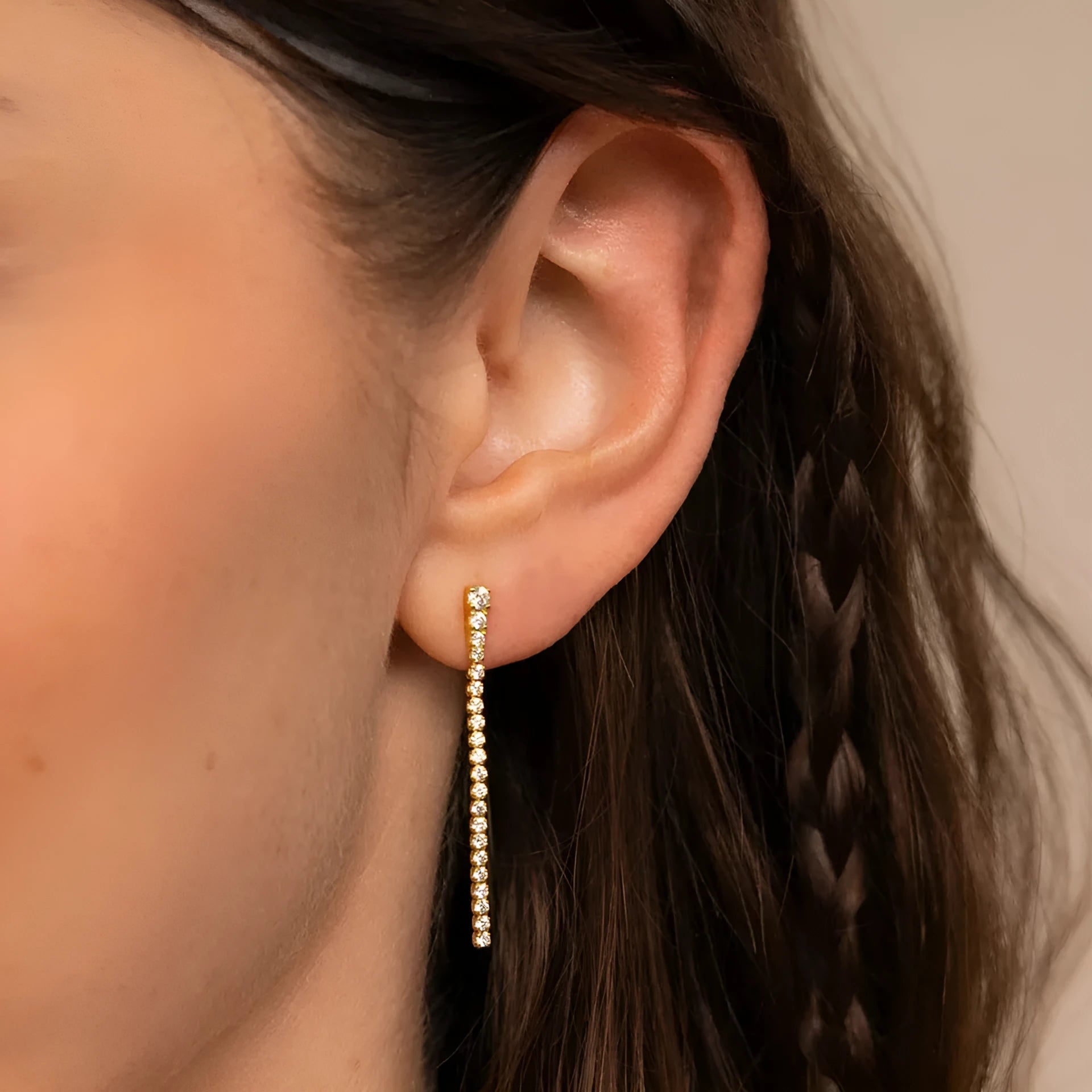 Sweet Elegance women's geometric zircon earrings in stainless steel, shown in gold and steel colour options.