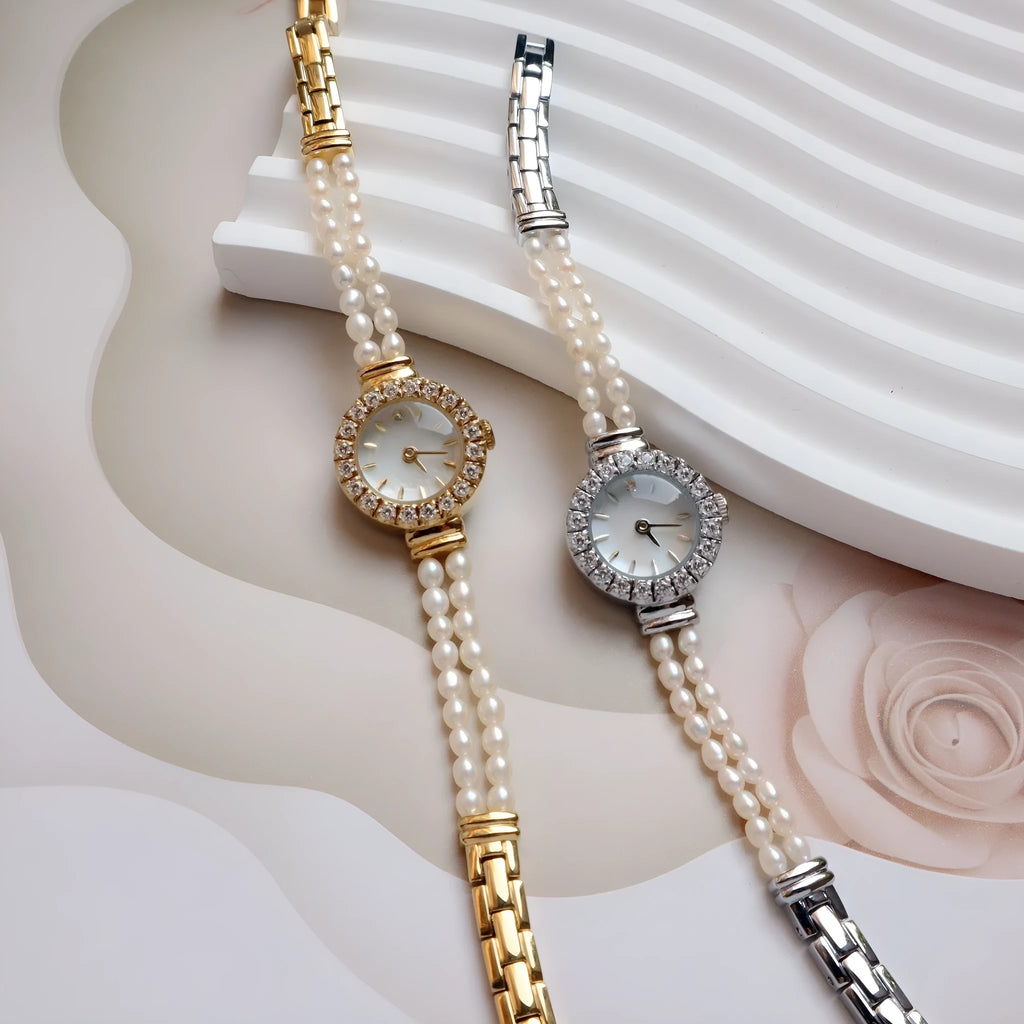 Women's light gold bracelet watch with freshwater pearls and round mineral glass dial