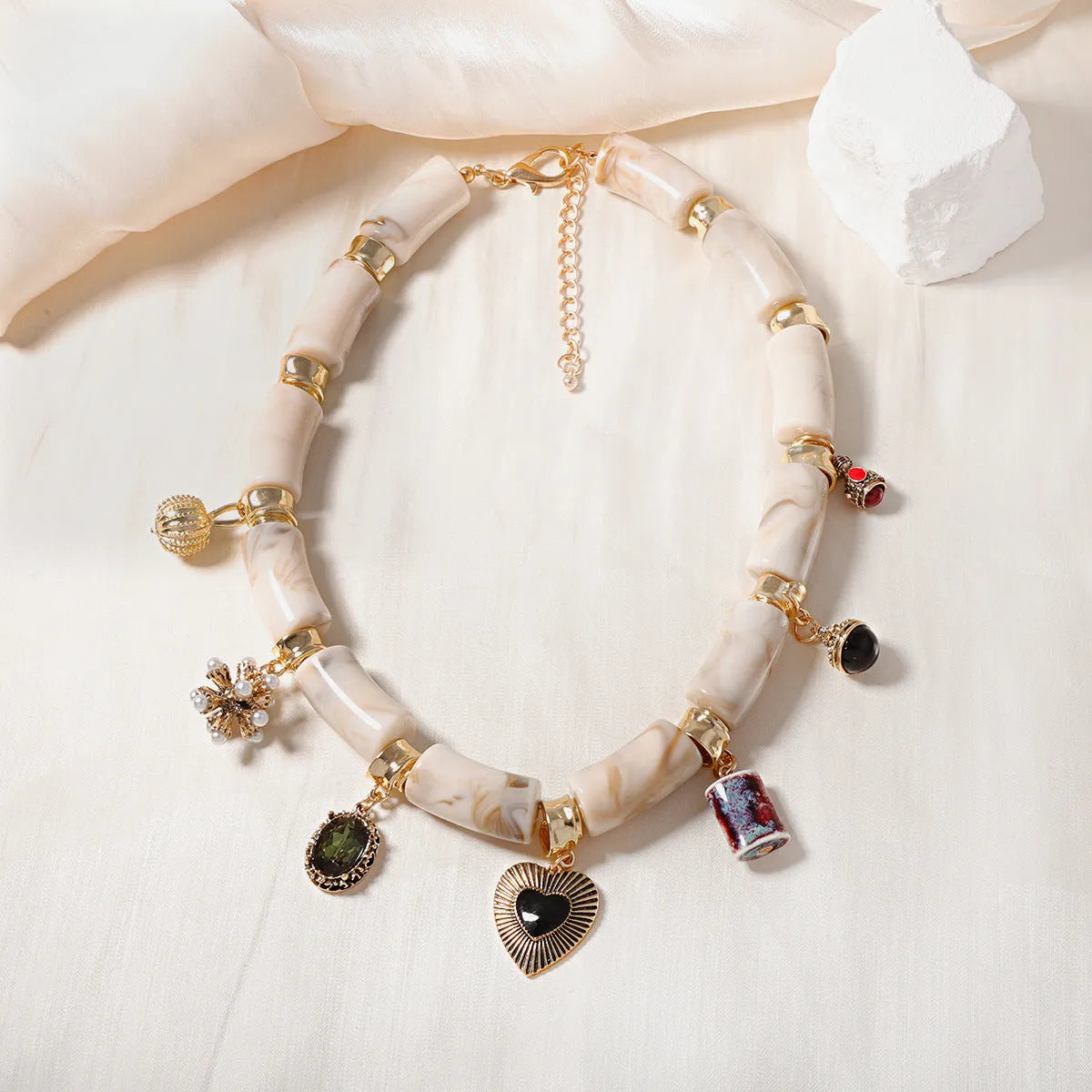 Heart-shaped resin and bamboo pendant necklace with electroplated chain