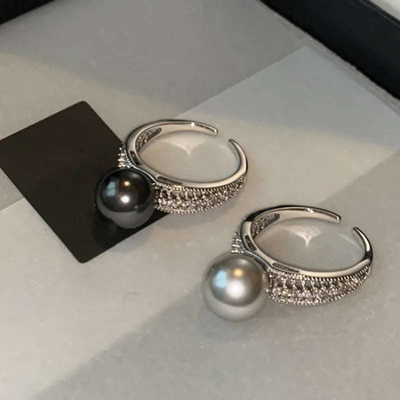 Adjustable opening copper ring with geometric shape and black pearl accents for women
