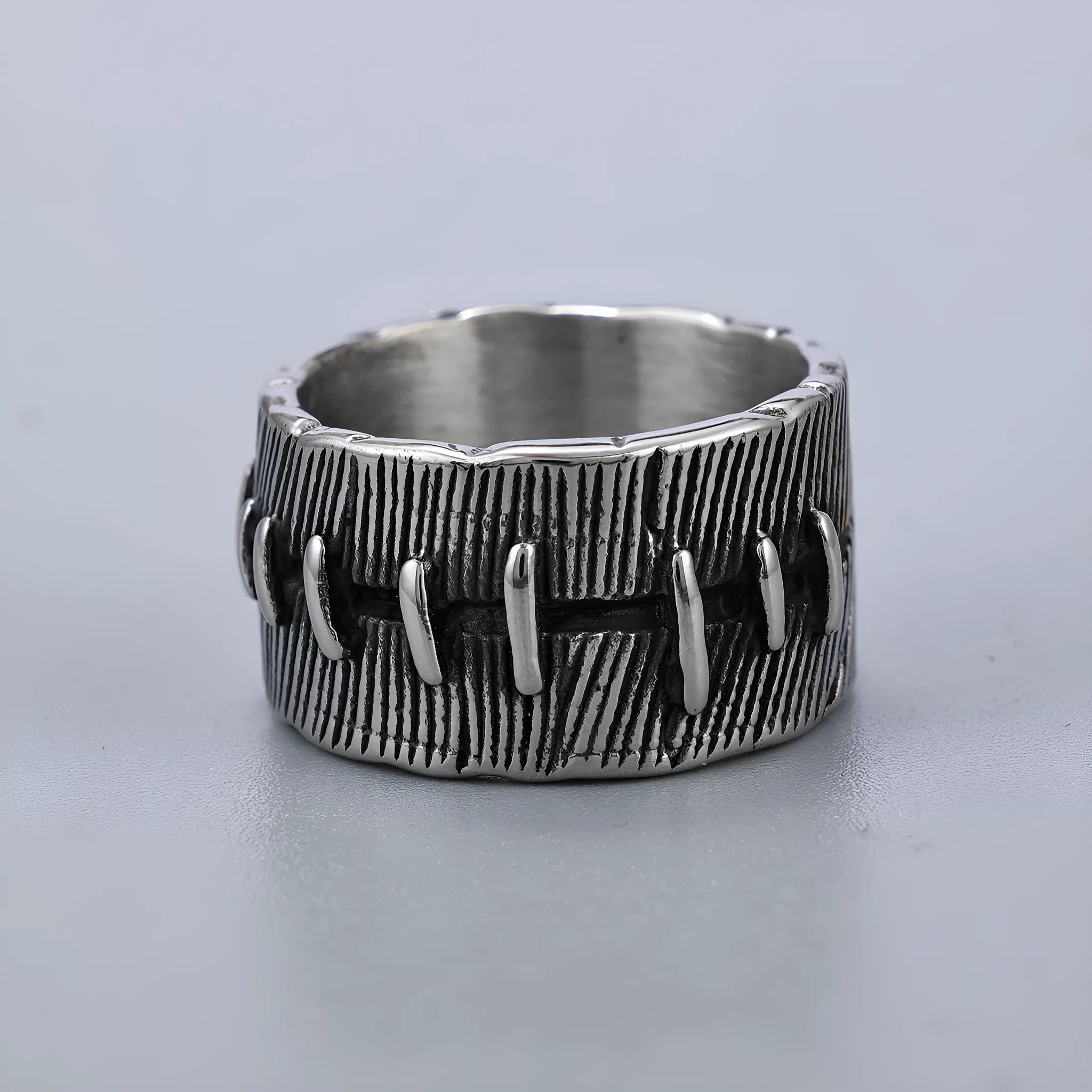 Geometric U-shaped titanium steel punk ring with double-ring construction in dark retro colour.