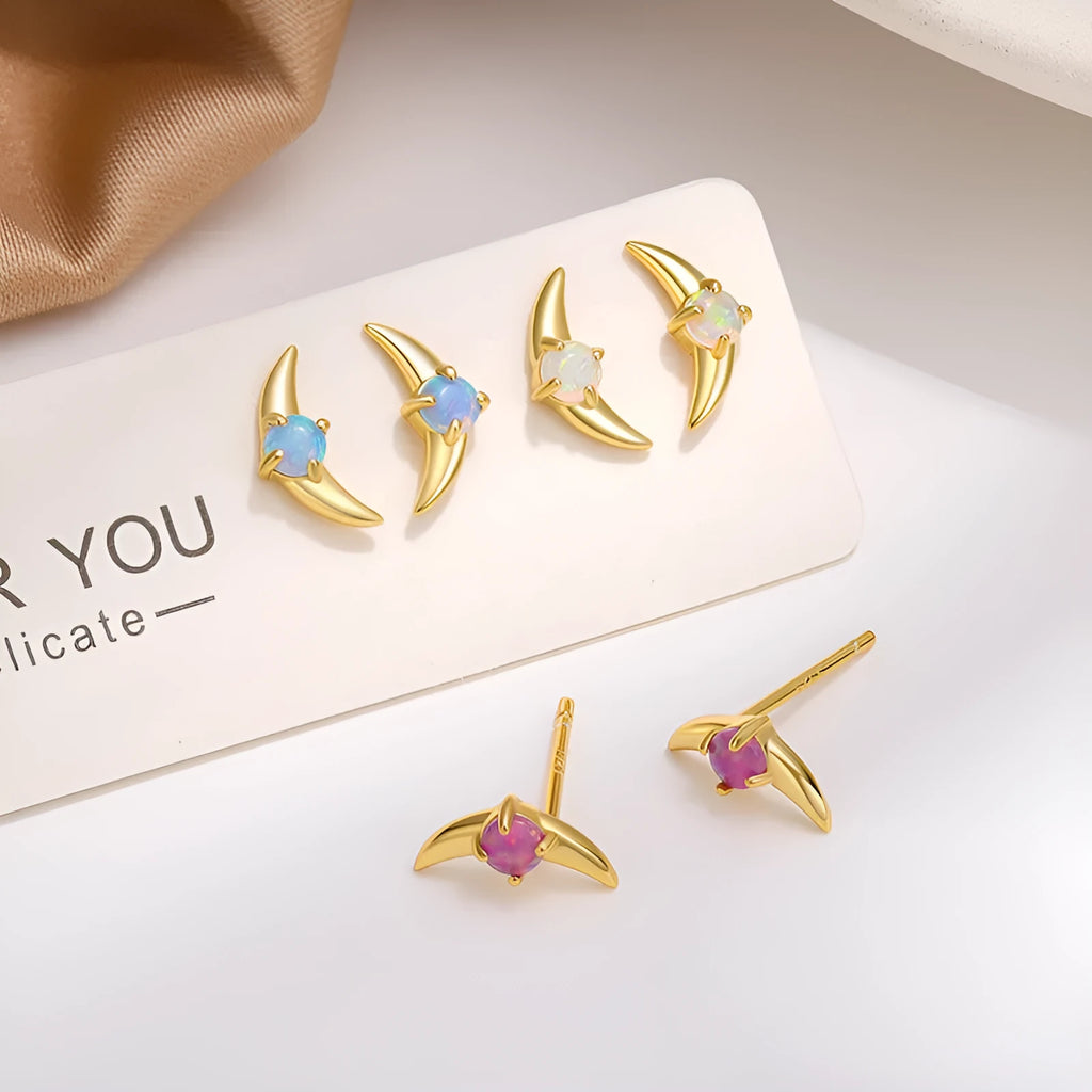 Geometric 925 silver earrings with electroplated gold or platinum finish and coloured stone.