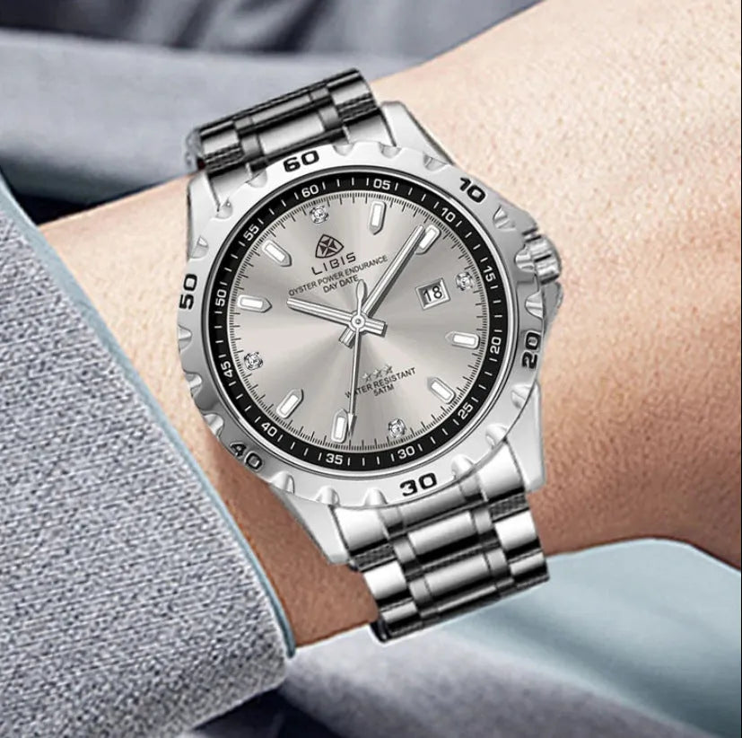 Men's silver case quartz watch with luminous hands and stainless steel strap