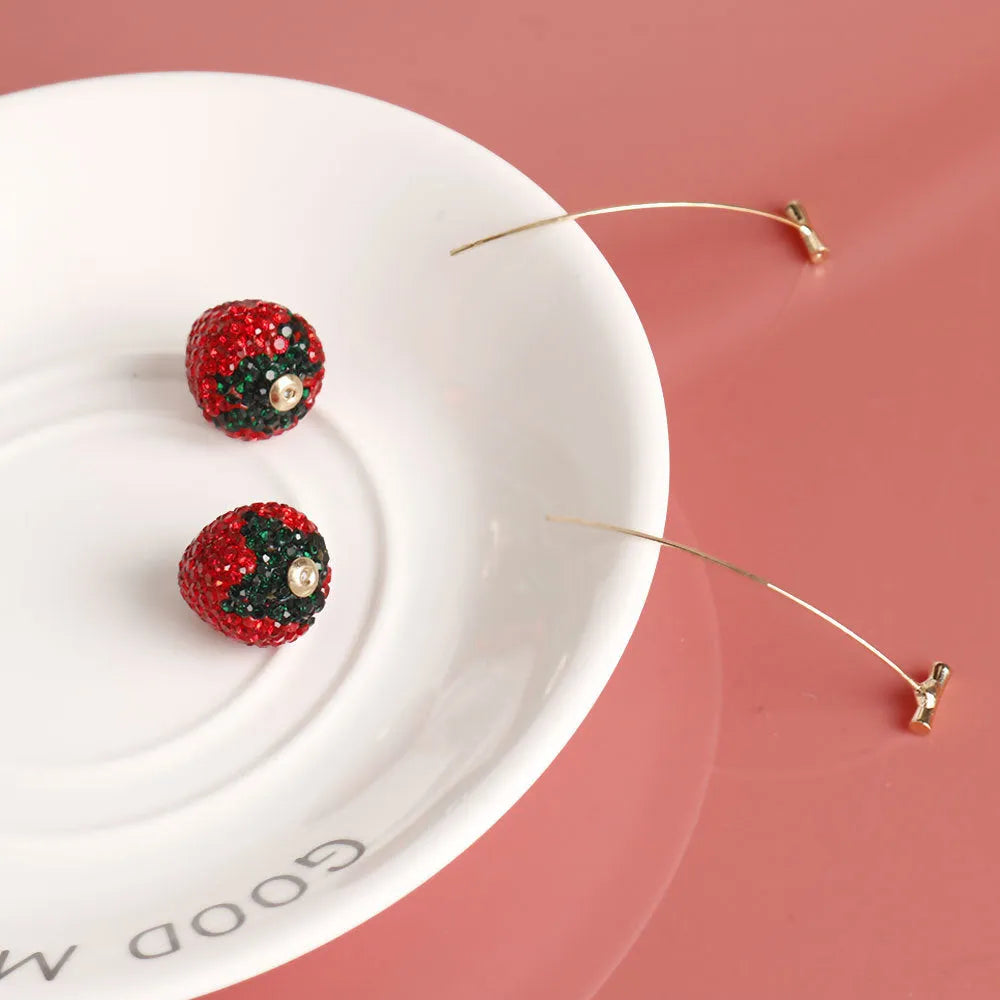 Geometric strawberry-shaped zinc alloy earrings for women in six colour options with spot drill texture.