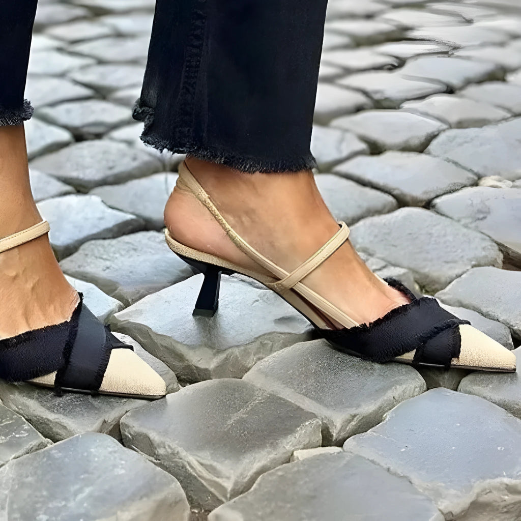 Apricot black colour block women's stiletto sandals with pointed toe and buckle strap.