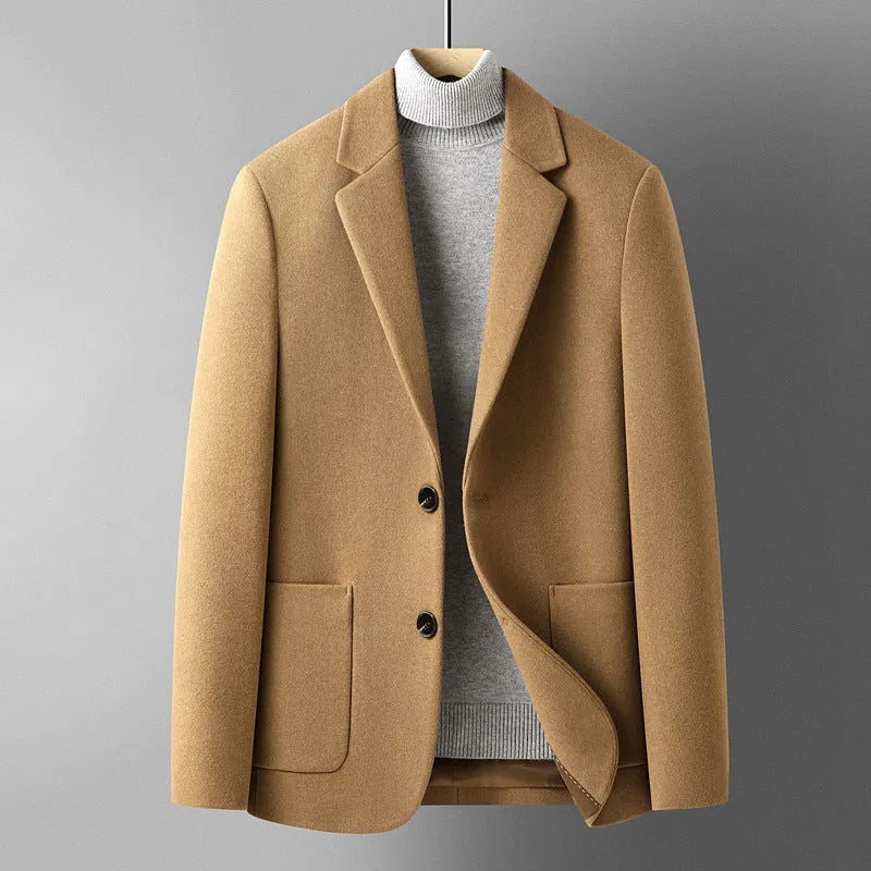 Men's slim fit solid colour wool suit jacket on a hanger, showing non-ironing finish and polyester lining detail.