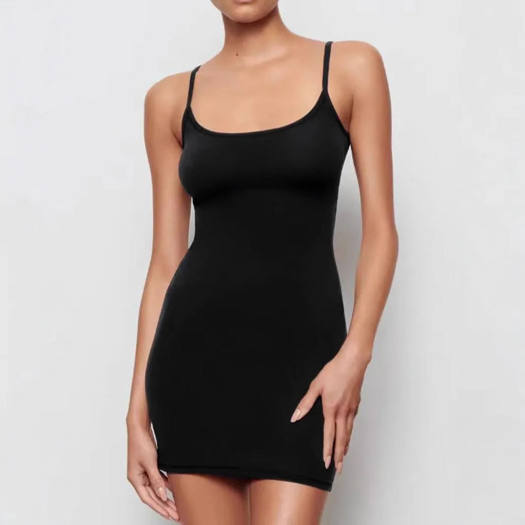 Black sling-style sheath dress with sleeveless design and short skirt length
