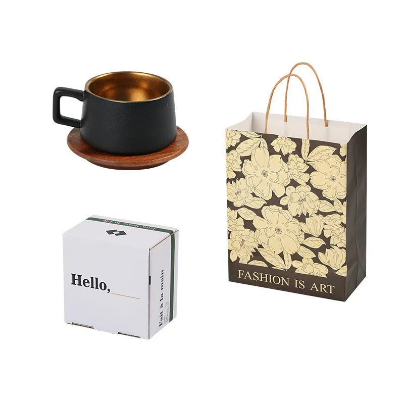 Gold and silver plated gift box next to a 250ml solid colour coffee travel mug.