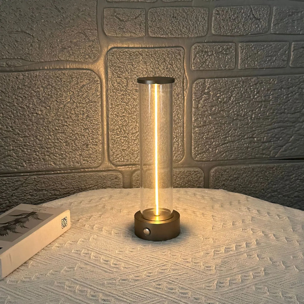 Slender LED glass light strip with magnetic mounting and USB charging cable