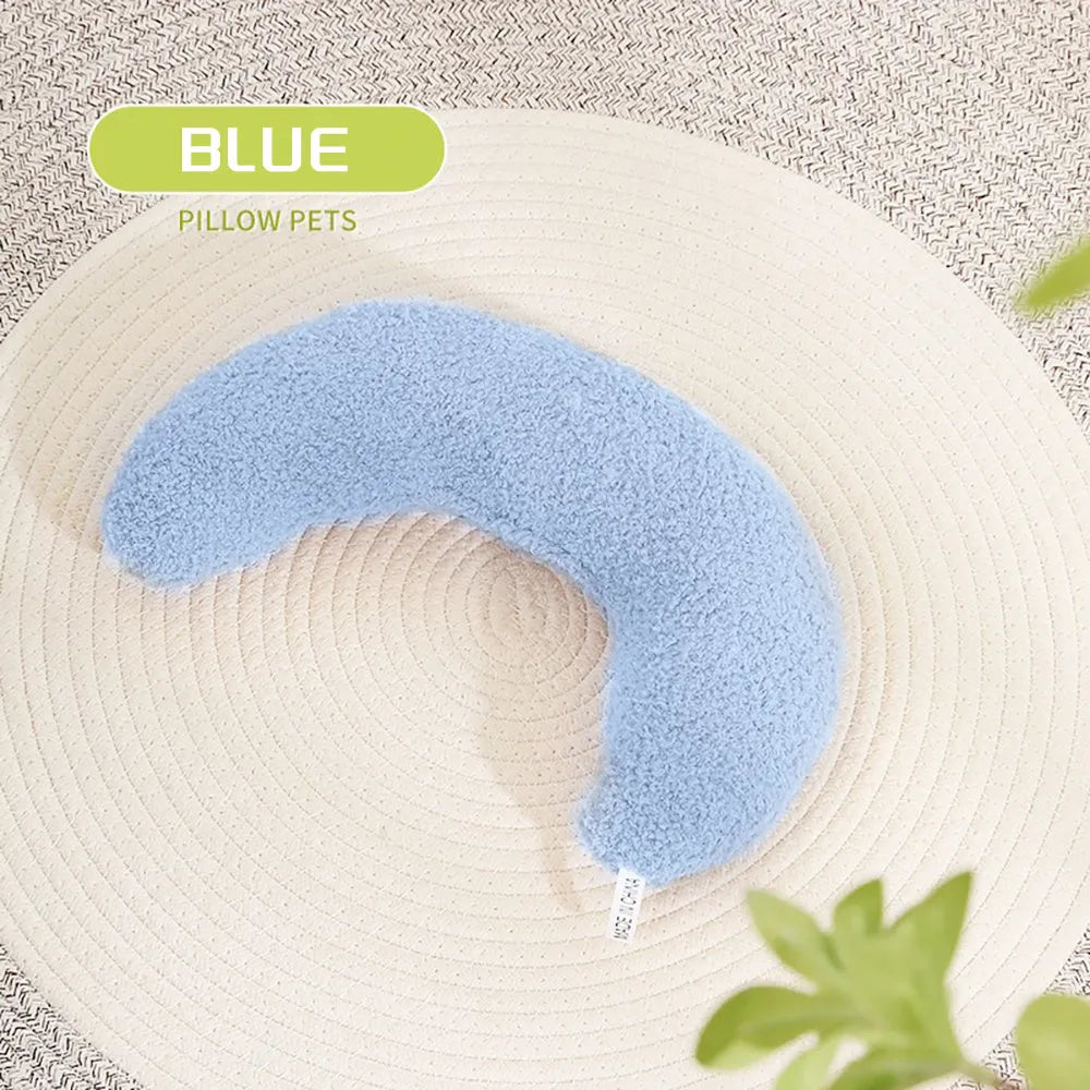 Blue U-shaped cat pillow with an adjustable fabric collar for neck support.