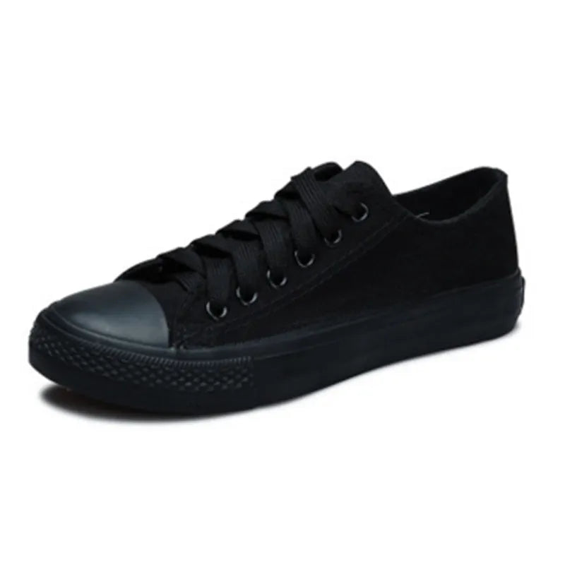 Women's solid colour canvas casual shoes shown in black, white black, white red, and all black colour options.