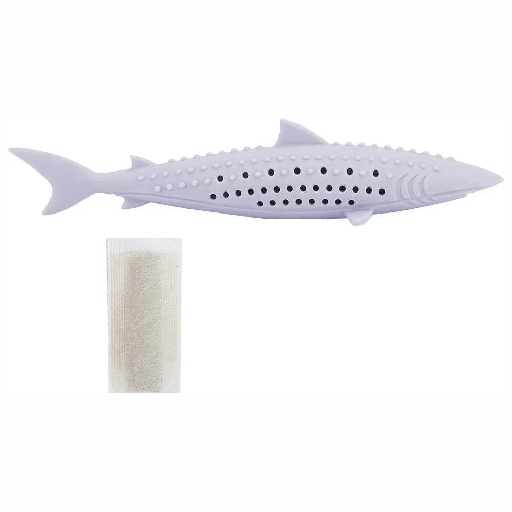Green silicone fish-shaped cat chew toy with dental cleaning texture and side holes