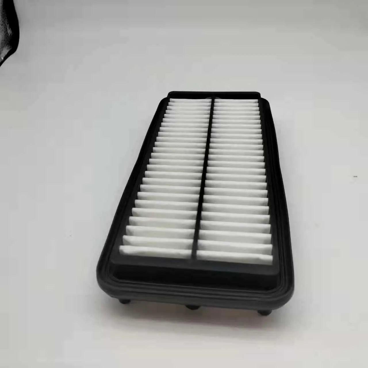Modern car air filter replacement with dimensions 256mm by 113mm by 40mm, black filter element