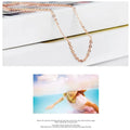 Women's heart-shaped pink artificial crystal pendant necklace with rose gold cross chain