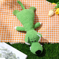 Animal-shaped plush dog toy with corn kernel texture for teeth cleaning and built-in sound device
