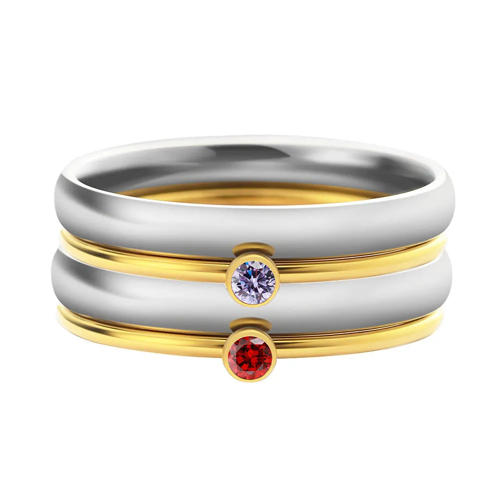 December colour birthstone engraved titanium steel ring with geometric shape on a plain background