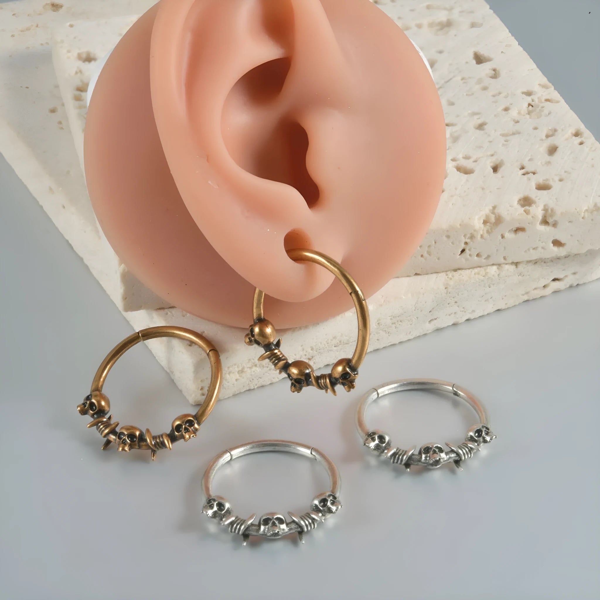 Copper punk earrings with vintage ghost head design in antique gold finish