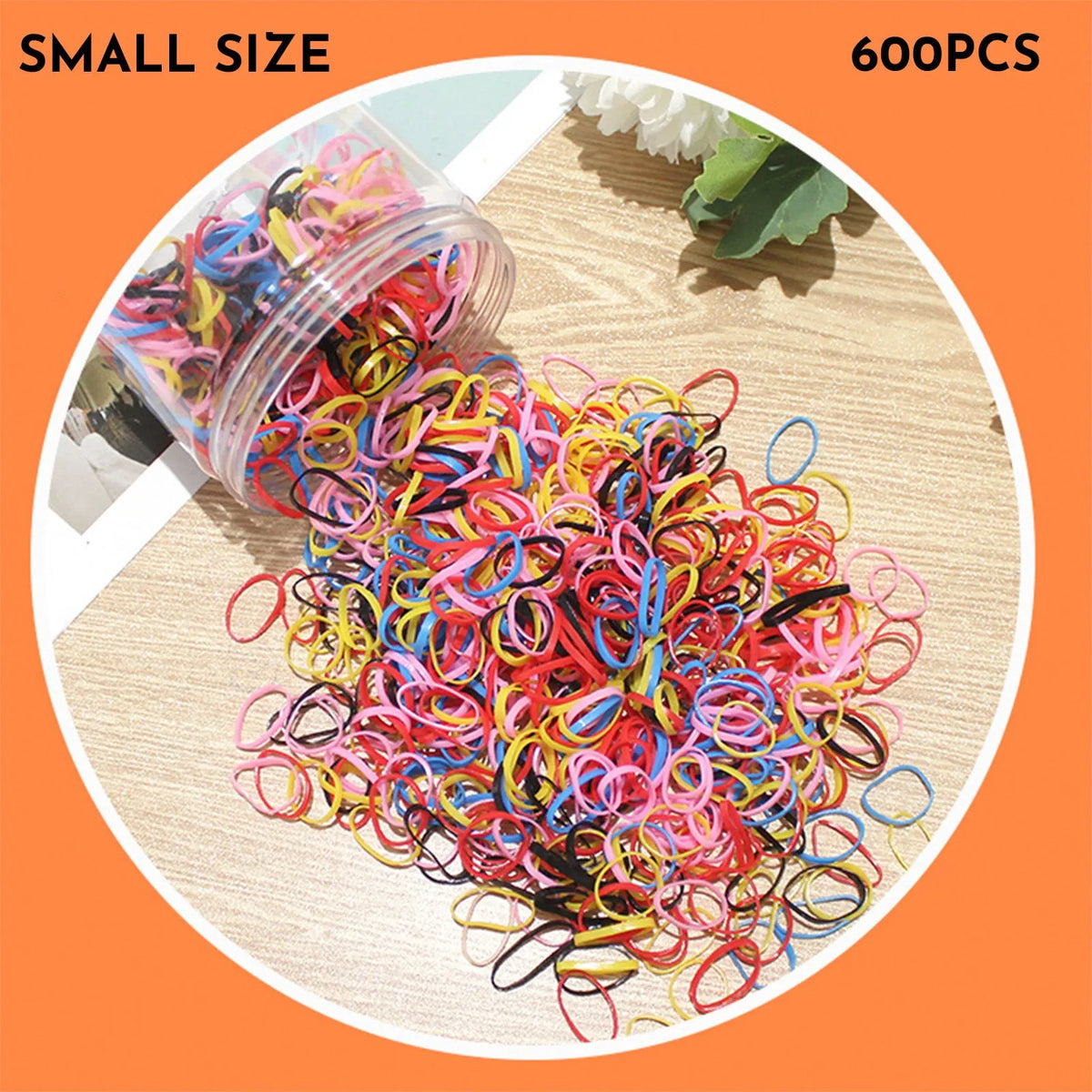 Assortment of colourful small TPU baby hair ties in a reusable plastic container.