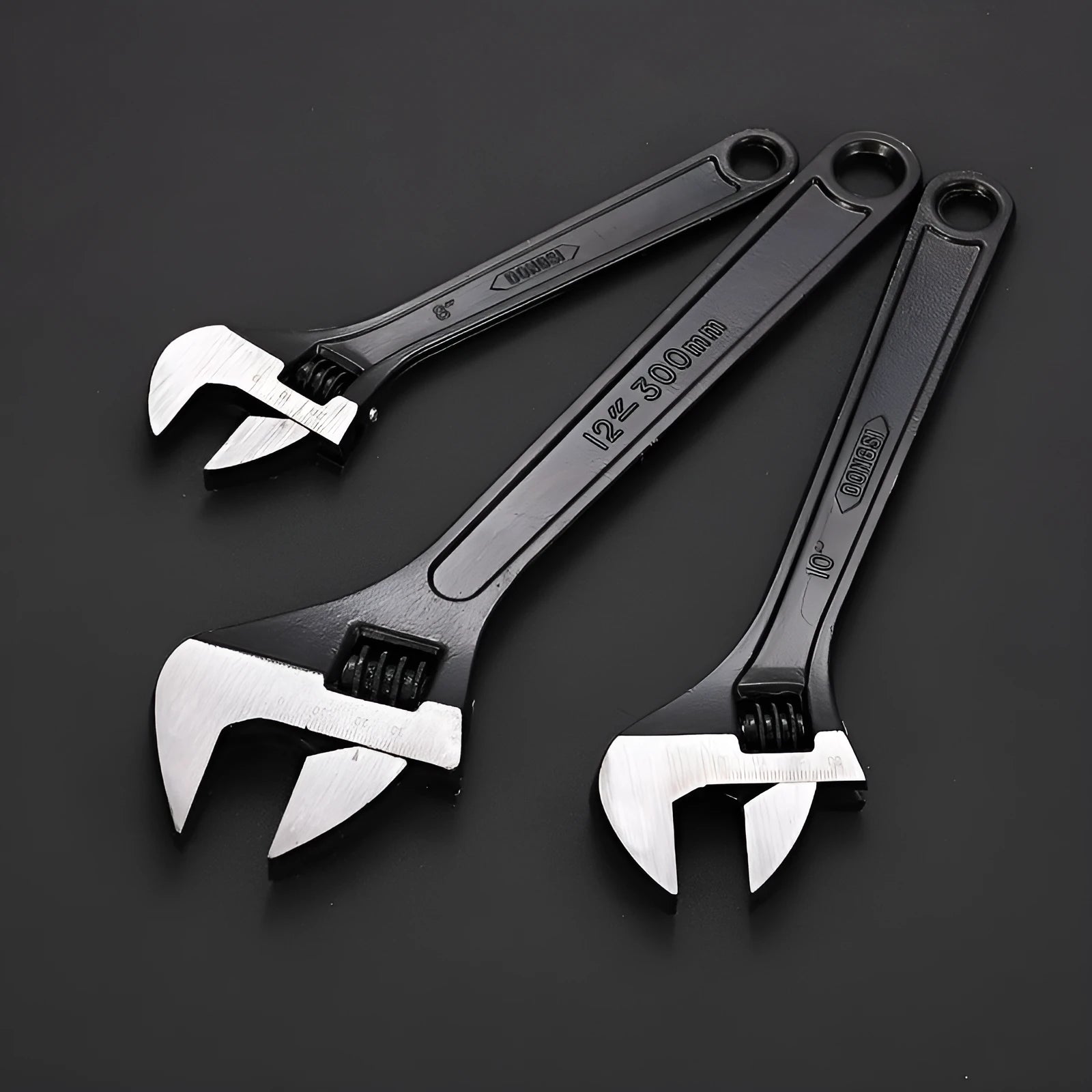 Stainless steel adjustable wrench with blackened finish showing adjustable jaw mechanism