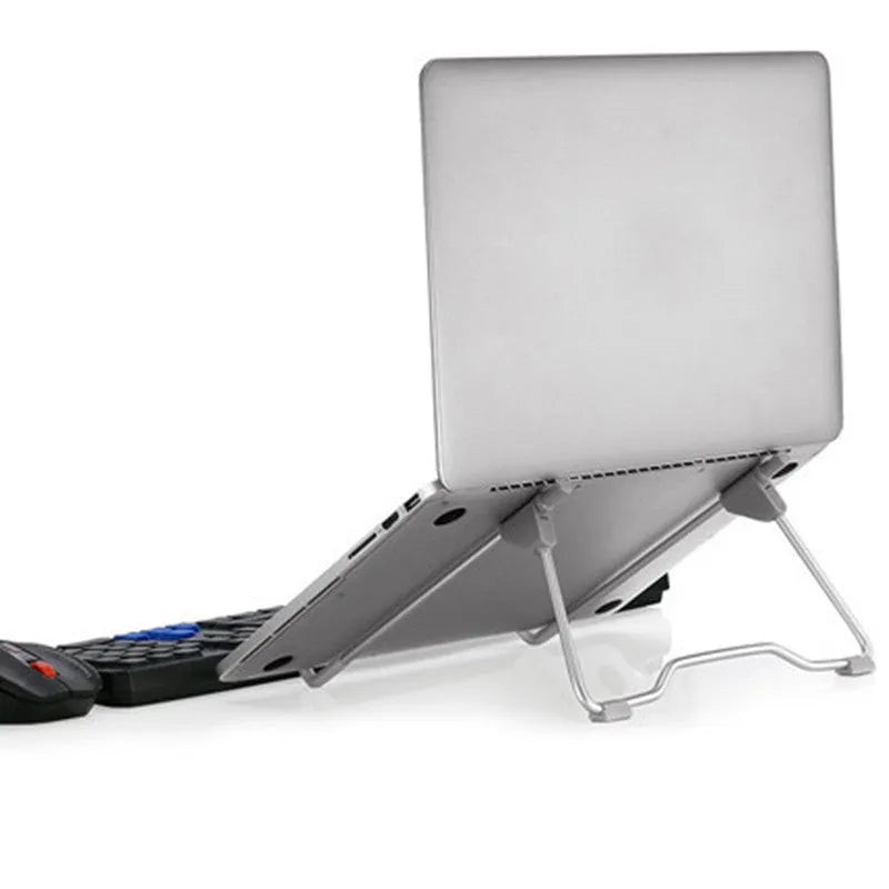 Grey foldable aluminium alloy and plastic laptop and phone stand shown in open and closed positions.