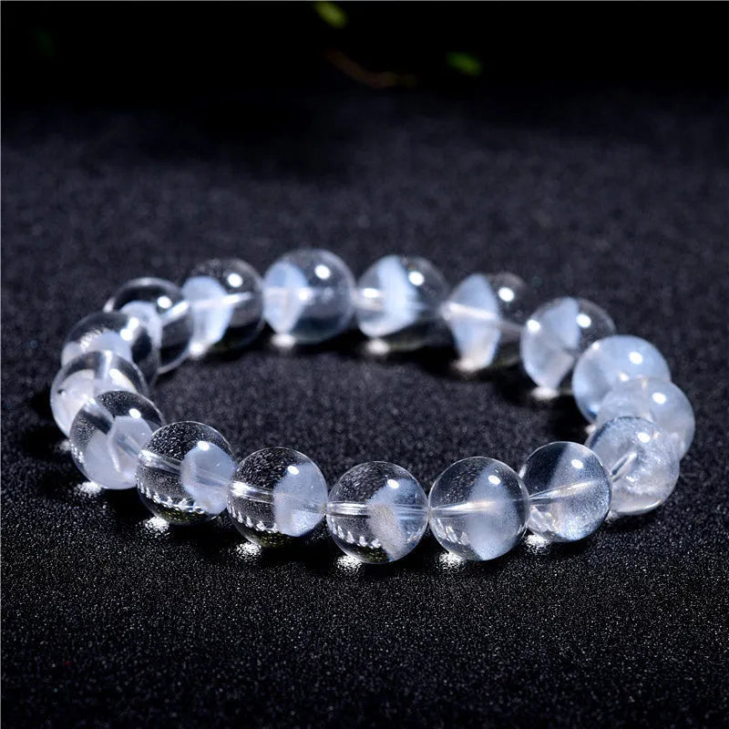 White crystal pyramid bracelet with ghost-like surface and Ruyi design elements showing multiple size options