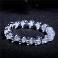 White crystal pyramid bracelet with ghost-like surface and Ruyi design elements showing multiple size options