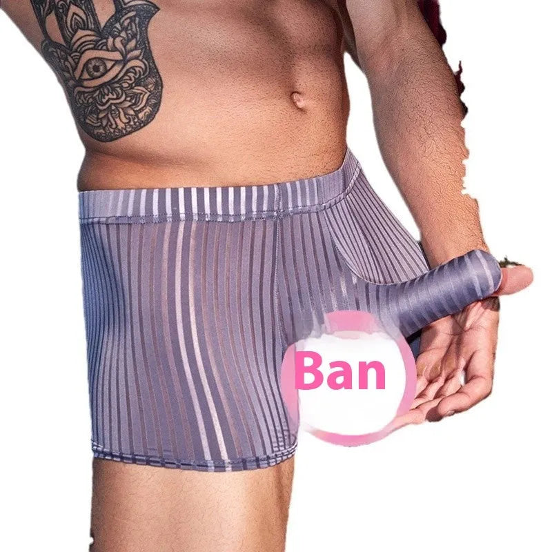 Men's black and white striped nylon boxer briefs on a grey background.