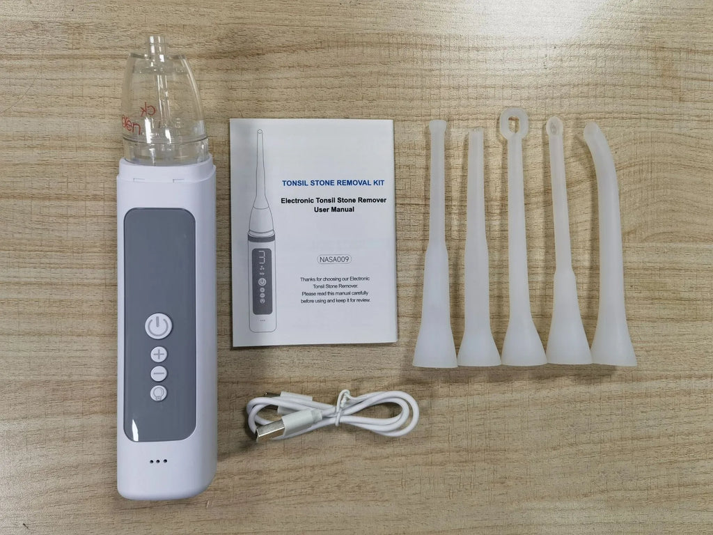 Milky white manual tonsil stone extractor oral cleaning tool set on a white background