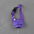 A black adjustable plastic dog muzzle shown on a size chart with options for red, blue, pink, and purple.