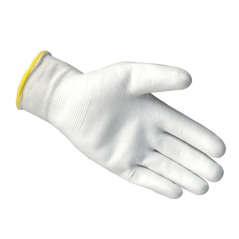 White PU coated labour gloves showing palm with textured coating, laid flat to show 24cm length.